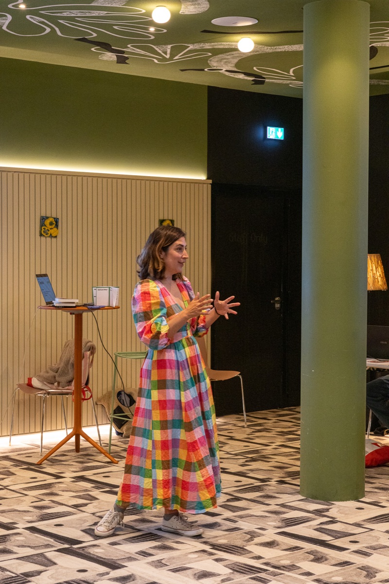 Lucy Werner speaking on stage